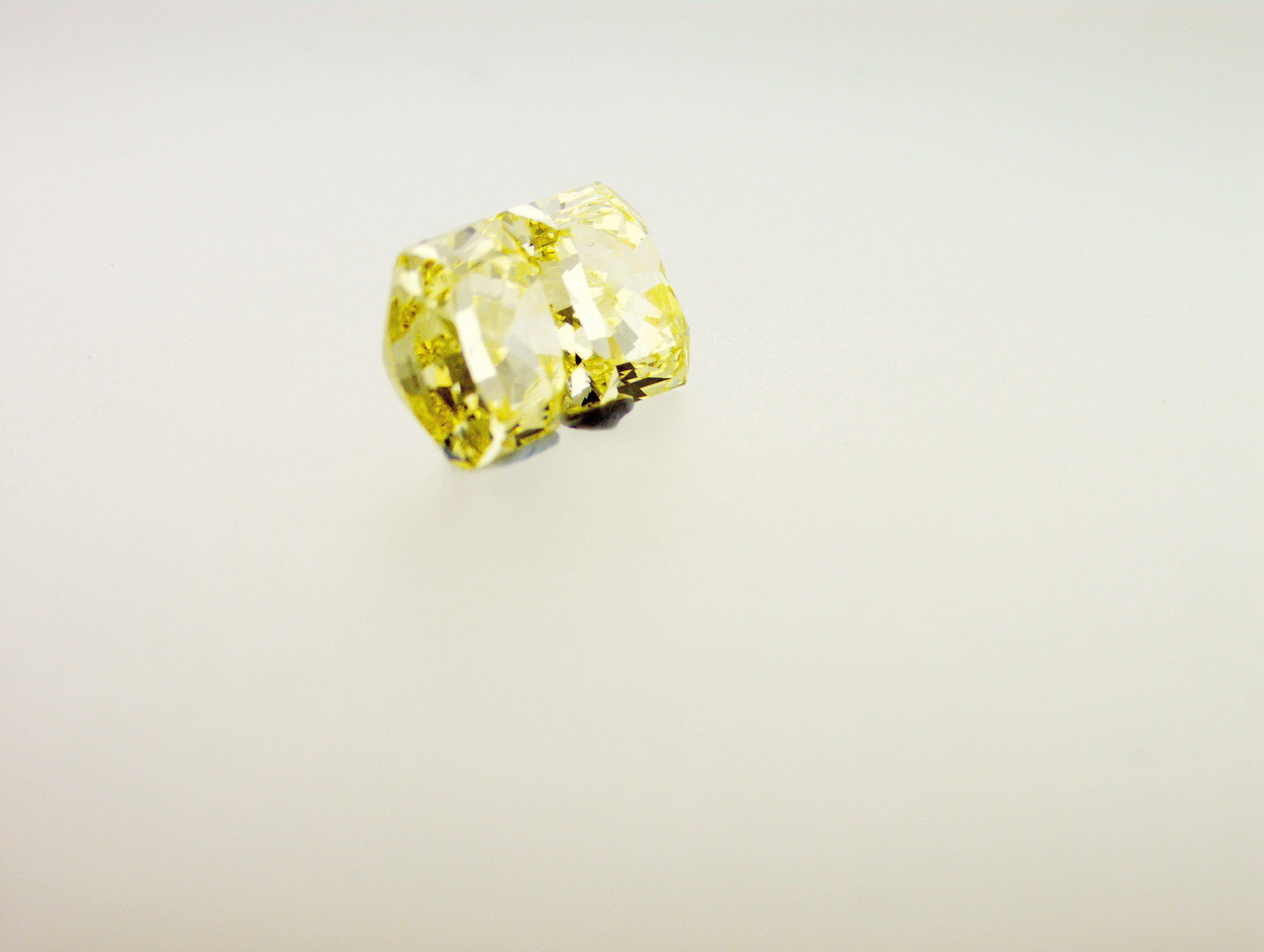 Modern GIA Certified Pair 3.02 and 3.07 carat Fancy Intense Yellow Diamonds For Sale
