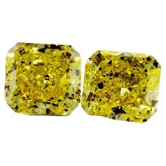 GIA Certified Pair 3.02 and 3.07 carat Fancy Intense Yellow Diamonds