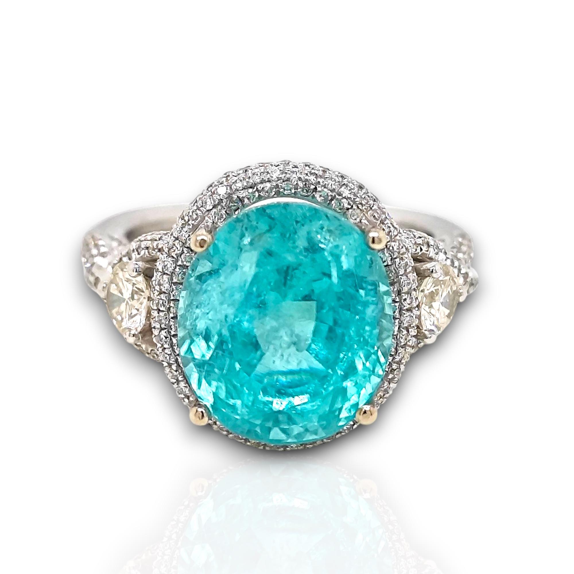 1 Paraiba Tourmaline Gemstone: 8.49 Carats
274 White Round Diamonds: 0.61 Carats
Metal: 18K White Gold, 6.80 Grams
GIA Certificate 1519787056
