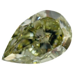 Poire certifiée GIA 8,27ct. Diamant naturel non serti F. jaune-jauneâtre vert VVS2