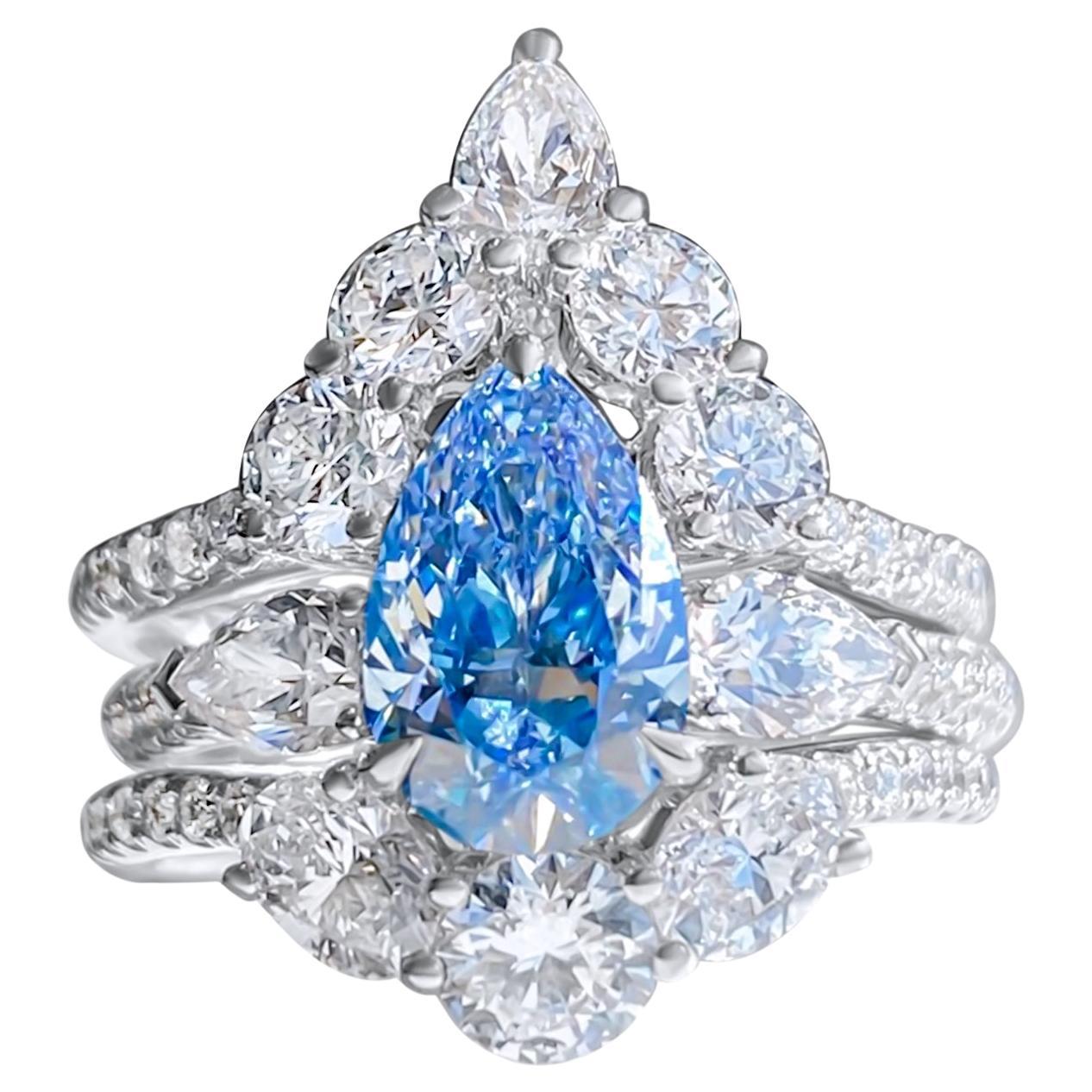 GIA Certified Pear Cut Blue Diamond Triple Band 3 Stone Wedding Ring For Sale
