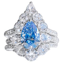 GIA Certified Pear Cut Blue Diamond Triple Band 3 Stone Wedding Ring