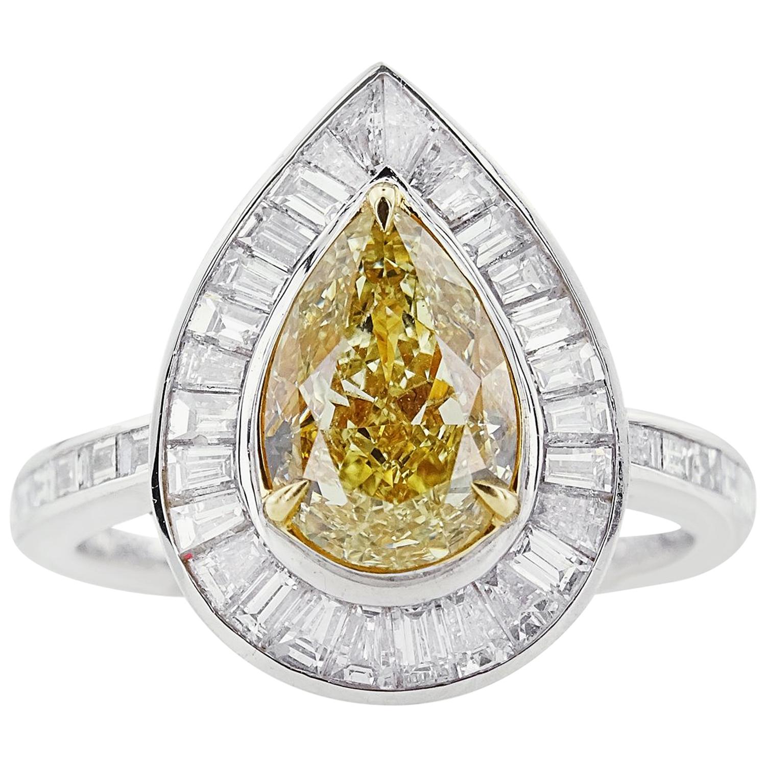 GIA Certified Pear Cut Fancy Yellow Diamond Ring, 3.08 Carat For Sale