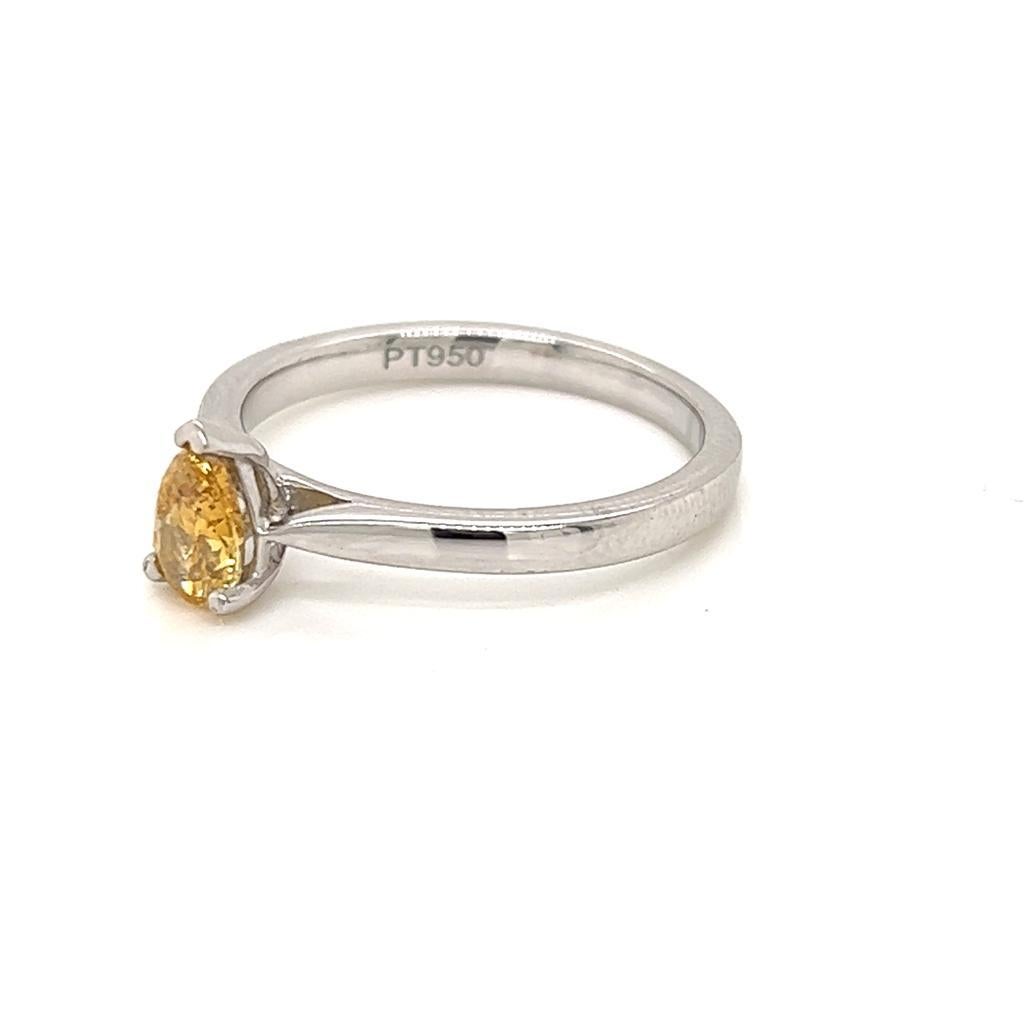 GIA Certified Pear shape 0.5 Carat Yellow Diamond Platinum Solitaire Ring In New Condition For Sale In London, GB