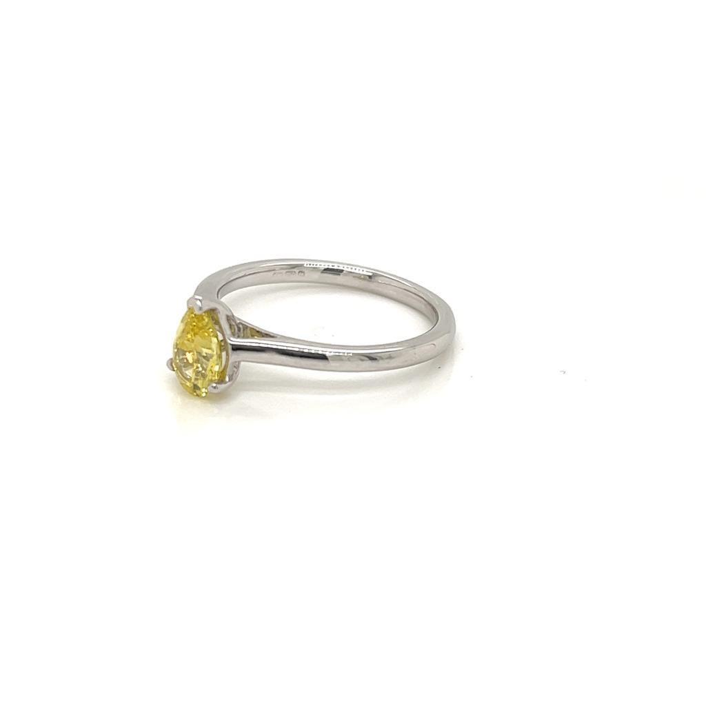 Contemporary GIA Certified Pear shape 0.7 Carat Yellow Diamond Platinum Solitaire Ring For Sale