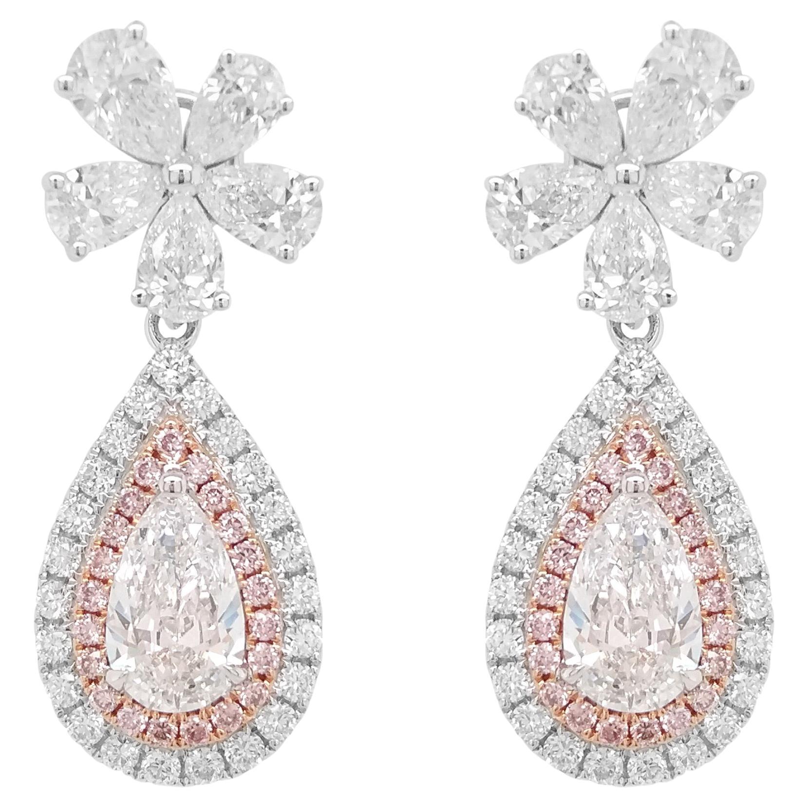 Orecchino con diamante bianco a forma di pera certificato GIA e diamante rosa in oro 18 carati