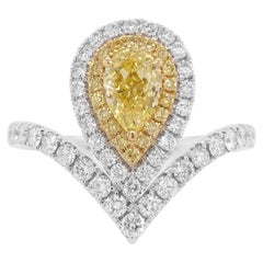 GIA certified Pear Shape Yellow Diamond and White Diamond Ring