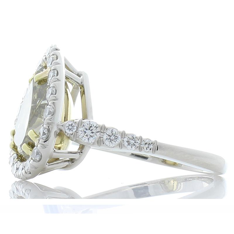 Contemporary GIA Certified 4.00 Carat Pear Shape Fancy Greenish Yellow Diamond Cocktail Ring