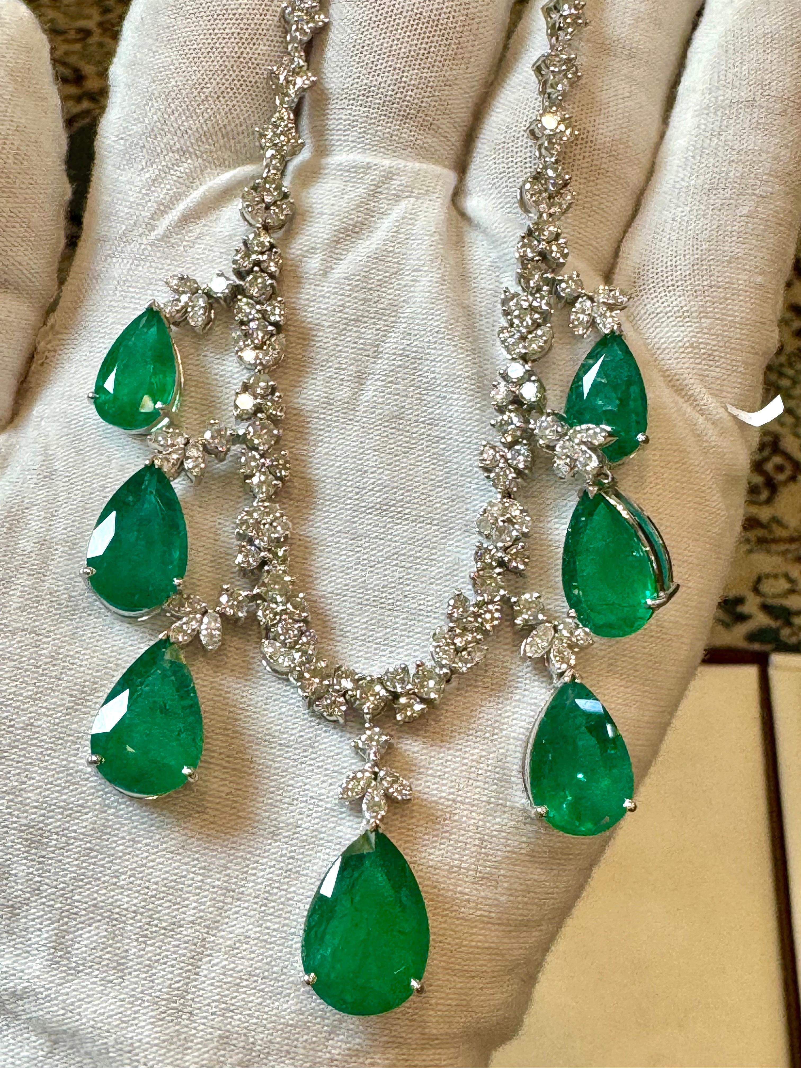 GIA Certified Pear Zambian Emerald & Diamond Bridal Drop Necklace 14 Karat white  Gold
14 karat white gold   natural Zambian  and diamond  necklace, consisting of 7 Pear shape Emeralds  with a total carat weigh of  35 carats, with  round brilliant