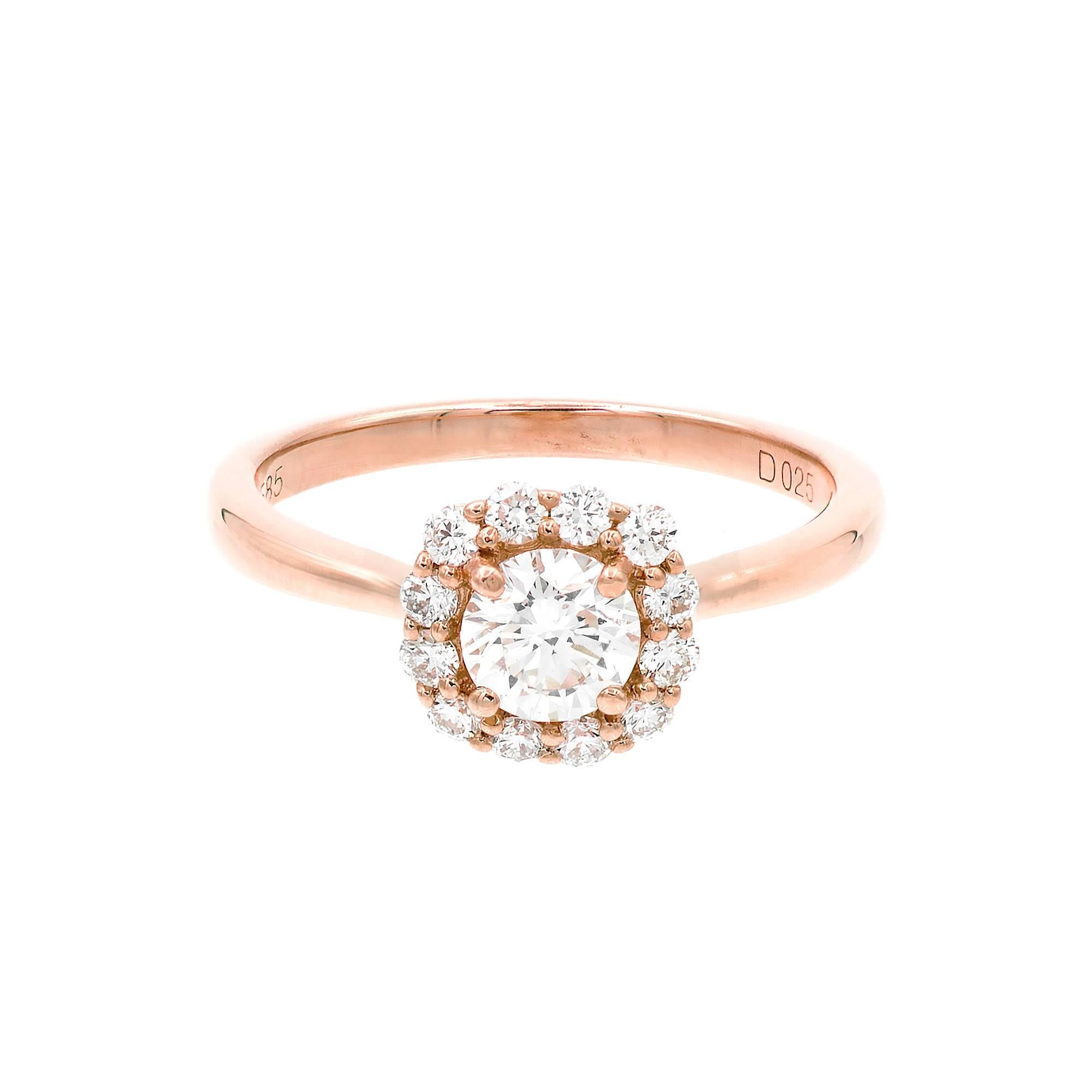Peter Suchy Vintage Inspired 14k rose gold halo Diamond engagement ring. GIA certified .51ct center Diamond F, SI1, surrounded by 0.25ct of F, VS full cut Diamonds.

1 round brilliant cut Diamond, approx. total weight .51cts, F, SI1, GIA certificate