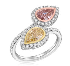 GIA Certified Fancy Pink and Yellow Pear Shape Diamond Bypass Platinum Rare Ring