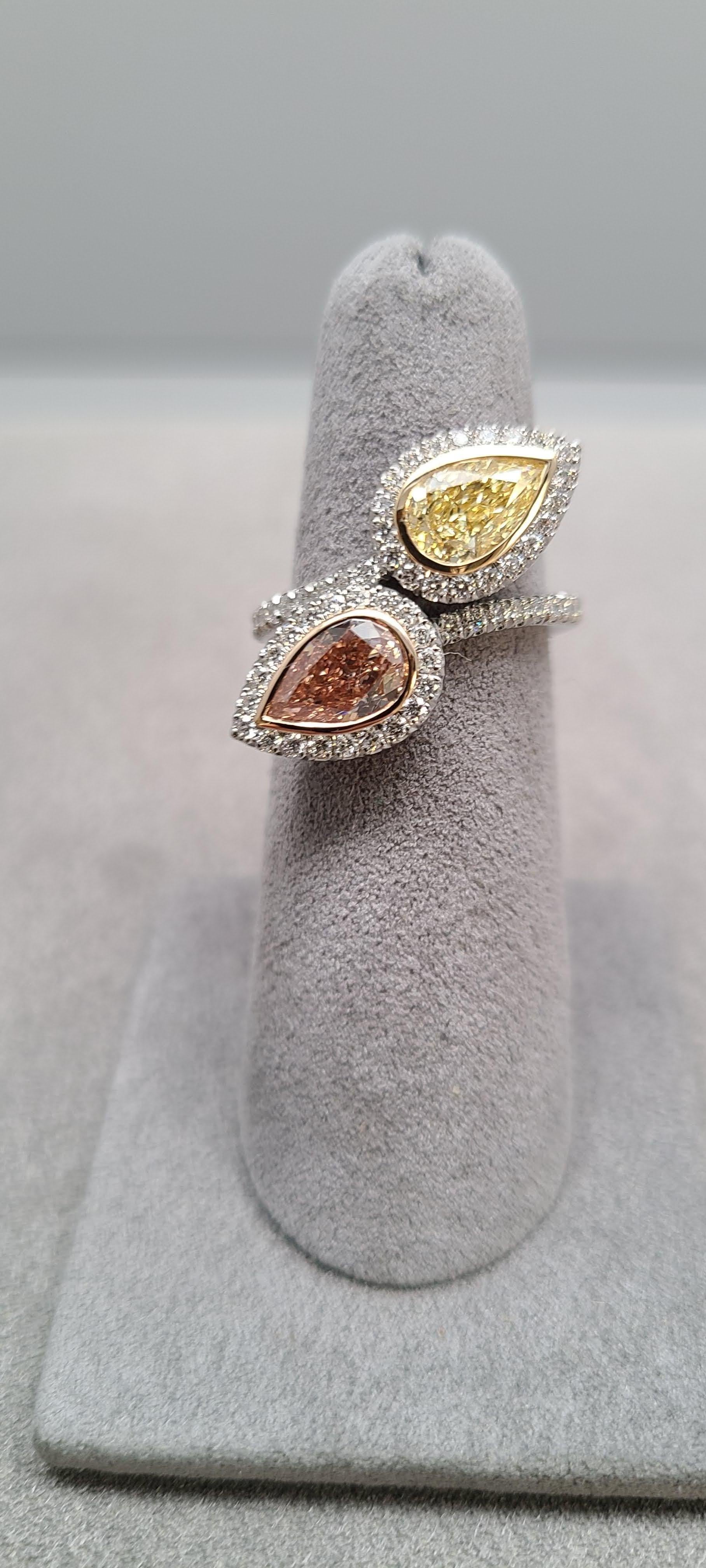 GIA Certified Fancy Pink and Yellow Pear Shape Diamond Bypass Platinum Rare Ring In New Condition For Sale In Whippany, NJ