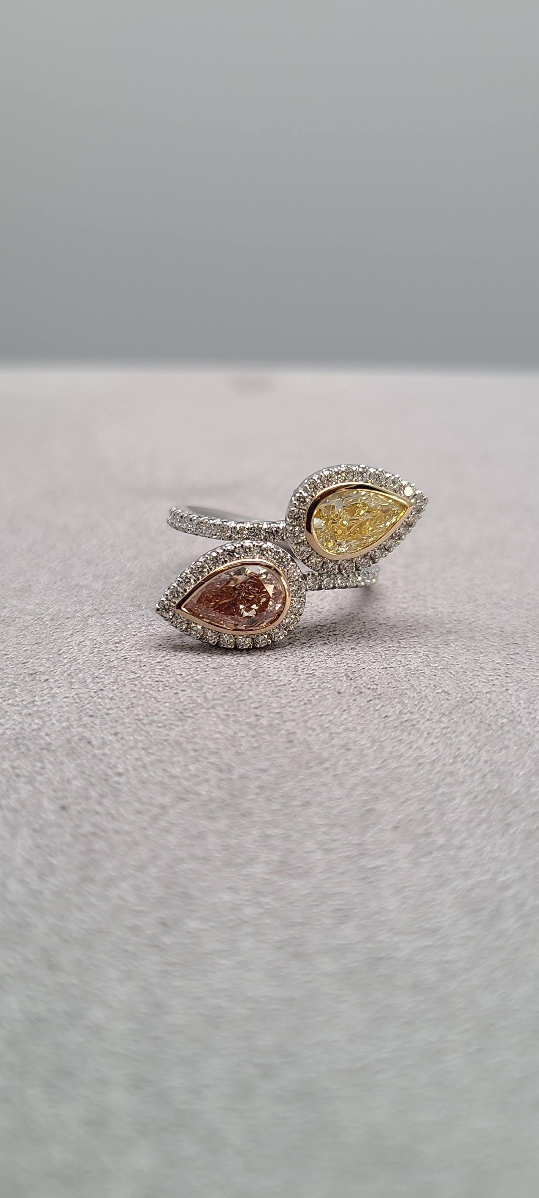 GIA Certified Fancy Pink and Yellow Pear Shape Diamond Bypass Platinum Rare Ring In New Condition For Sale In Whippany, NJ
