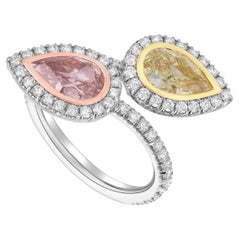 GIA Certified Fancy Pink and Yellow Pear Shape Diamond Bypass Platinum Ring