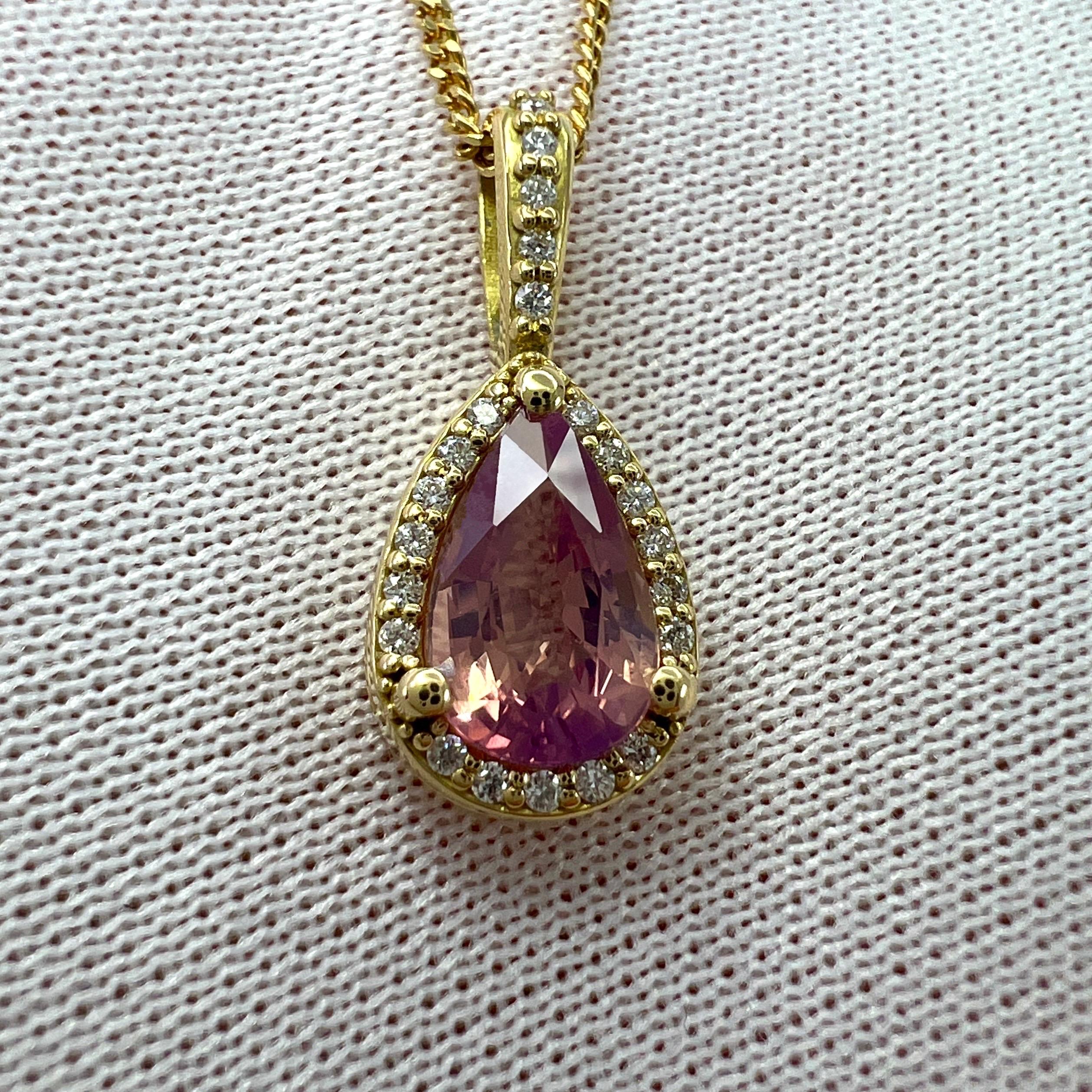Fine Untreated Natural Pear Cut Pink Sapphire And Diamond 18k Yellow Gold Halo Pendant Necklace.

1.06ct GIA certified natural sapphire with a fine bright pink colour with subtle orange undertones. Often called 'padparadscha' in the trade. 
Top