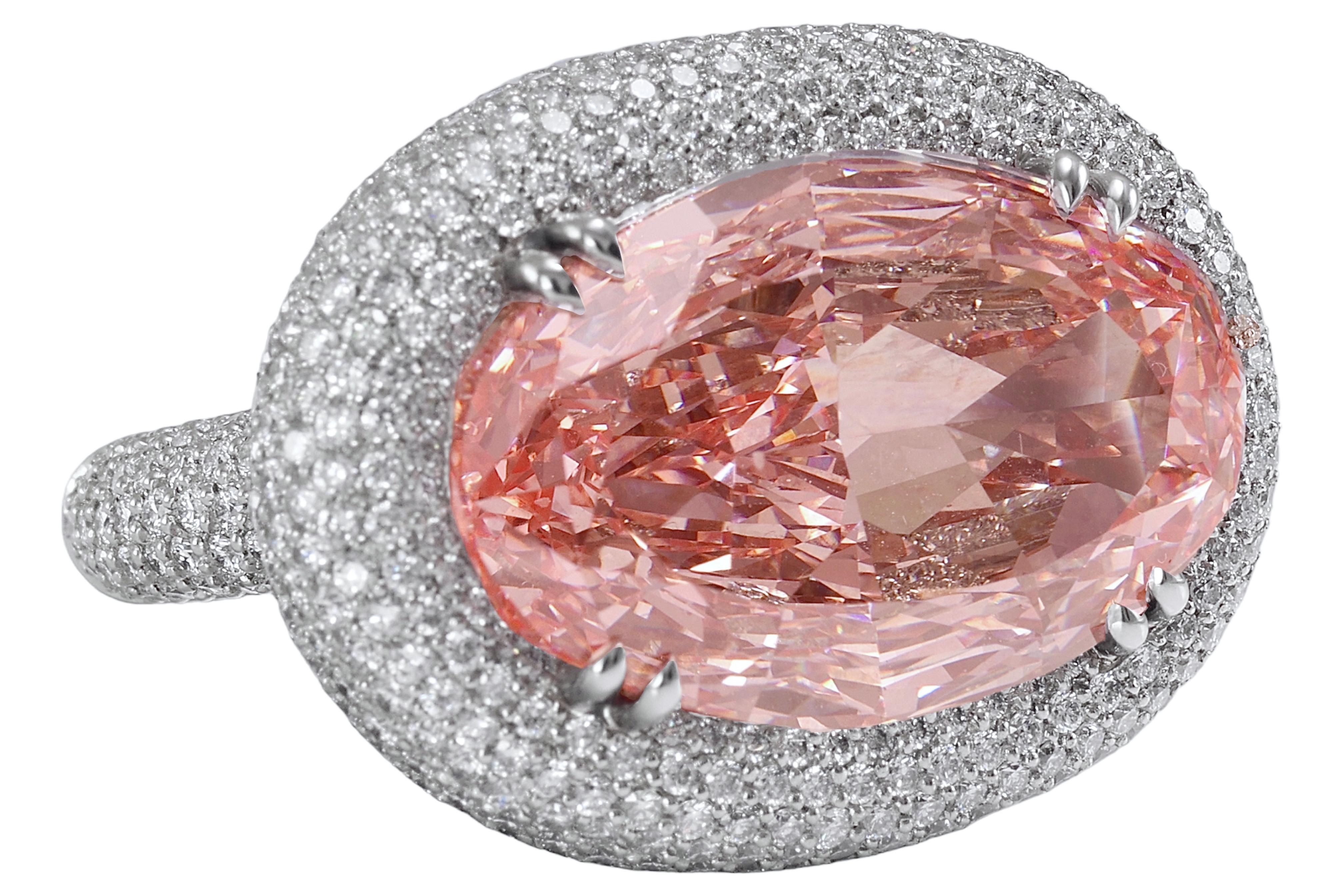 GIA Certified Platinum 15 Carat Fancy Intense Enhanced Pink Diamond Ring 

Amazing Pink Diamond Ring with Pavé diamonds set in solid Hand Made Platinum Ring.

Matching Platinum Wedding Ring can be purchased to go with this Ring as well as on