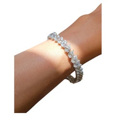 Issac Nussbaum GIA Certified Platinum 23.74 Carats Diamond Pear Tennis Bracelet
