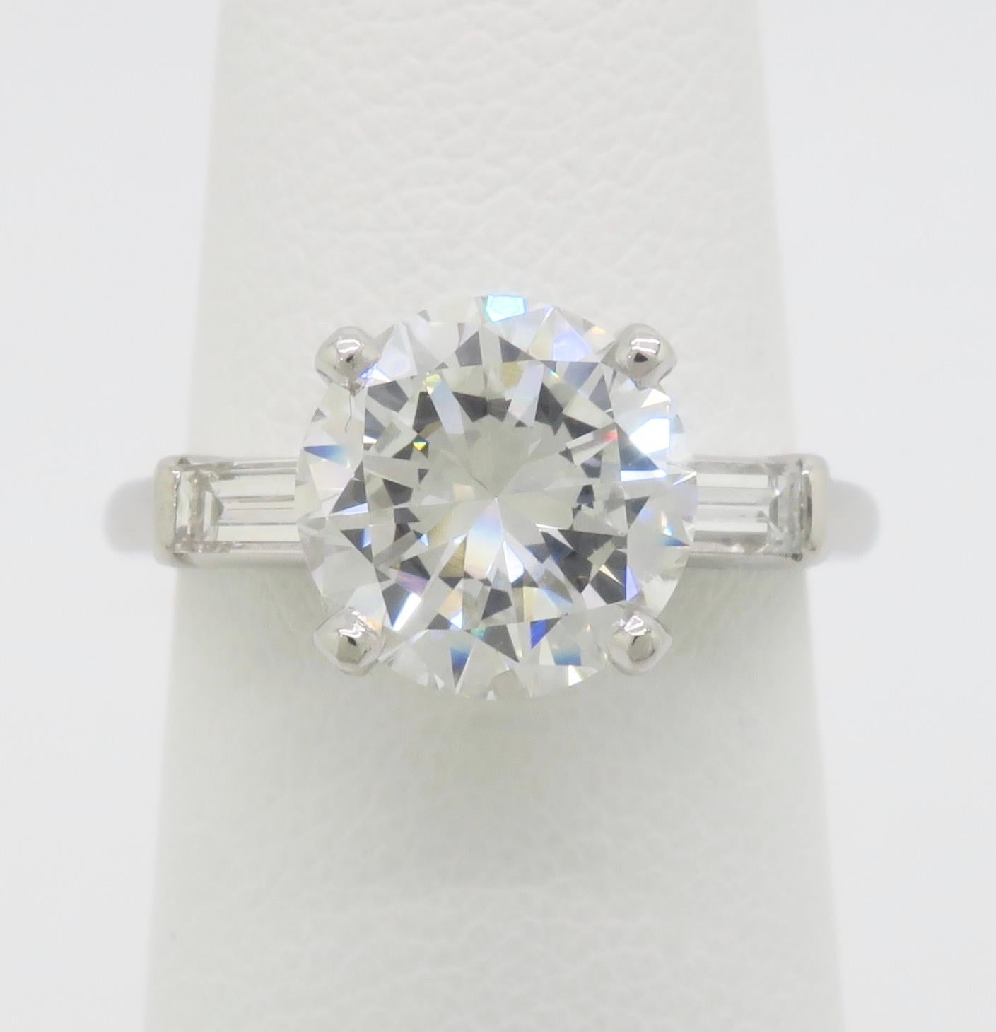 Stunning Platinum Vintage Diamond Engagement Ring Featuring a GIA Certified 2.18ct Center Diamond. 

Center Diamond Carat Weight: 2.18ct Earth Mined
Center Diamond Cut: Round Brilliant cut 
Center Diamond Color: G
Center Diamond Clarity: