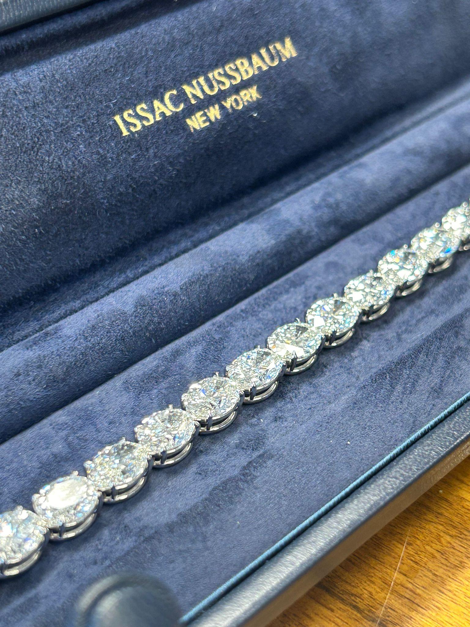 this exquisite bracelet is the epitome of all these qualities. Picture yourself wearing this stunning accessory, its shimmering brilliance GIA certified platinum Oval shape diamond tennis bracelet with colorless (D-G) and SI1-I2 (clarity). Catching