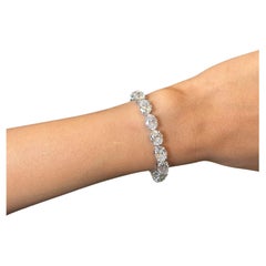 Issac Nussbaum Platinum 28.62 Carat Oval Diamond Tennis Bracelet.