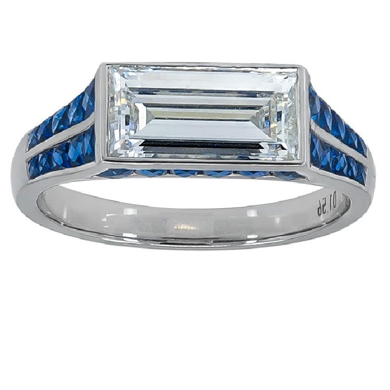 GIA Certified 1.56 Carat Baguette Diamond engagement ring with 1.20 carat sapphires set in platinum.
