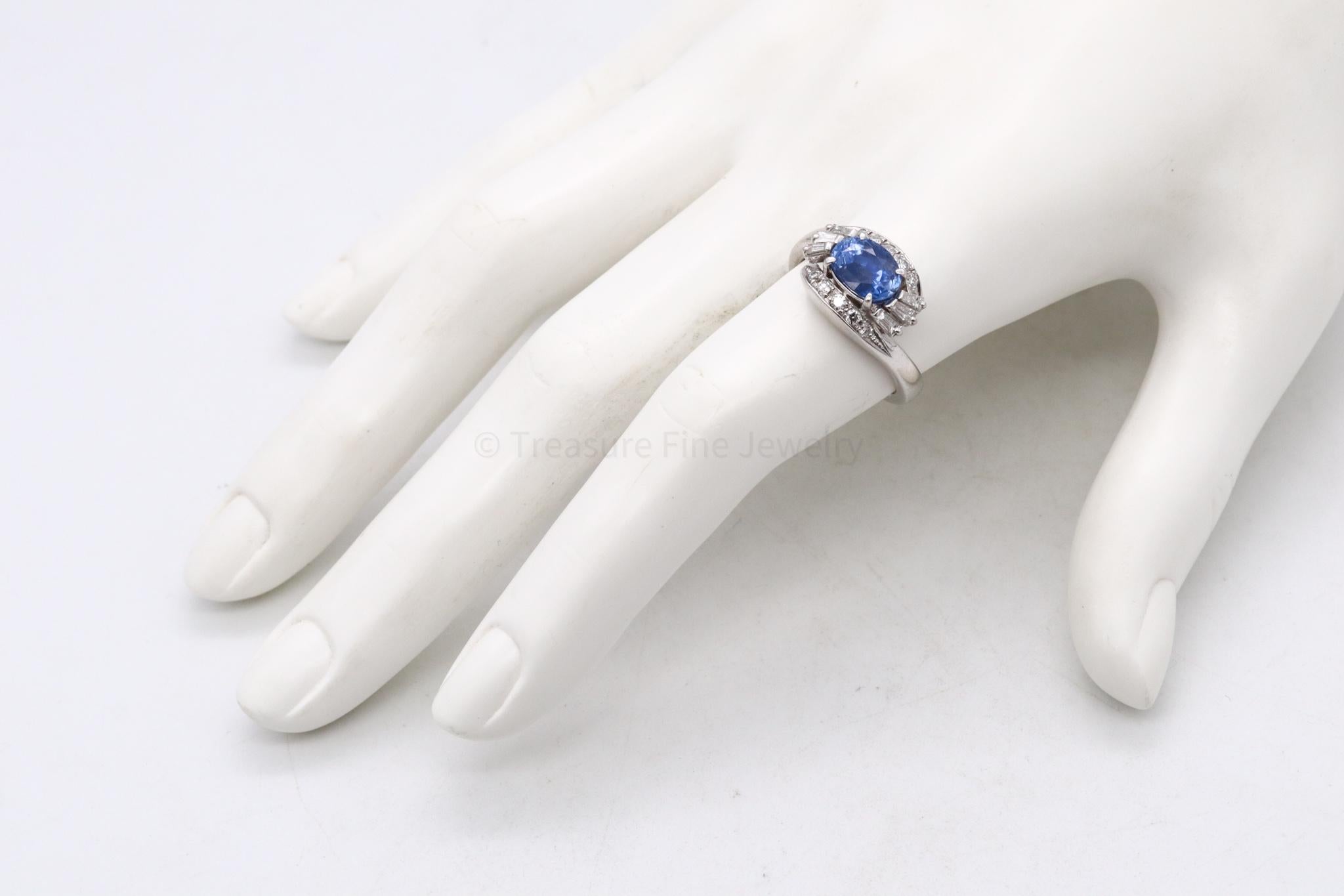 Cocktail ring with Natural Gemstones.

A modern contemporary piece carefully crafted in solid .900/.999 platinum. Is embellished, with four-prongs that hold an oval cut (8.7 x 6.4 x 6.82 mm) of a natural not heated blue sapphire from Sri-Lanka