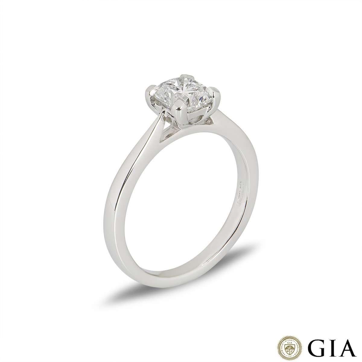 A stunning platinum cushion cut diamond engagement ring. The ring comprises of a cushion cut diamond in a four claw setting with a weight of 1.01ct, E colour and VS2 clarity. The ring is currently a size UK M - EU 52 - US 6 but can be adjusted for a