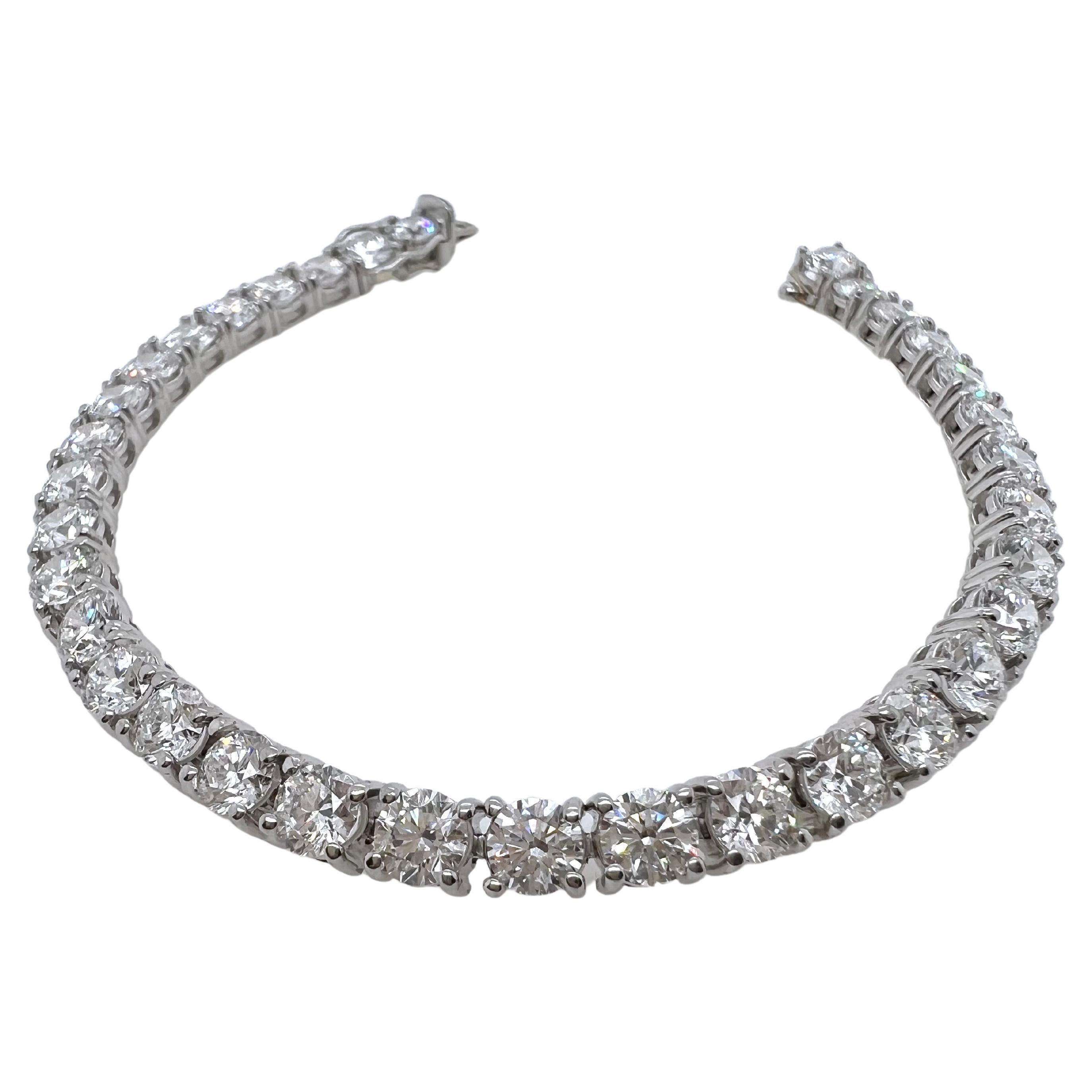 This diamond tennis bracelet is a special heirloom quality piece.  Every diamond is GIA certified, matched perfectly.  Each diamond is 0.40 ct, D color, VS2 clarity, no fluorescence and excellent in cut, polish, and symmetry.  The handmade platinum