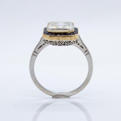 GIA Certified Platinum Emerald Cut Diamond and Sapphire Engagement Ring