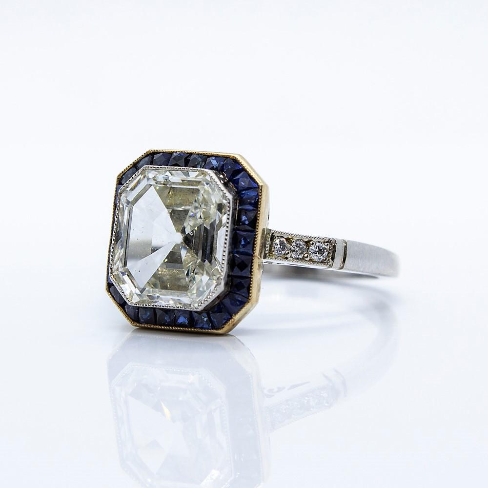 GIA Certified Platinum Emerald Cut Diamond and Sapphire Engagement Ring In Excellent Condition In Scottsdale, AZ
