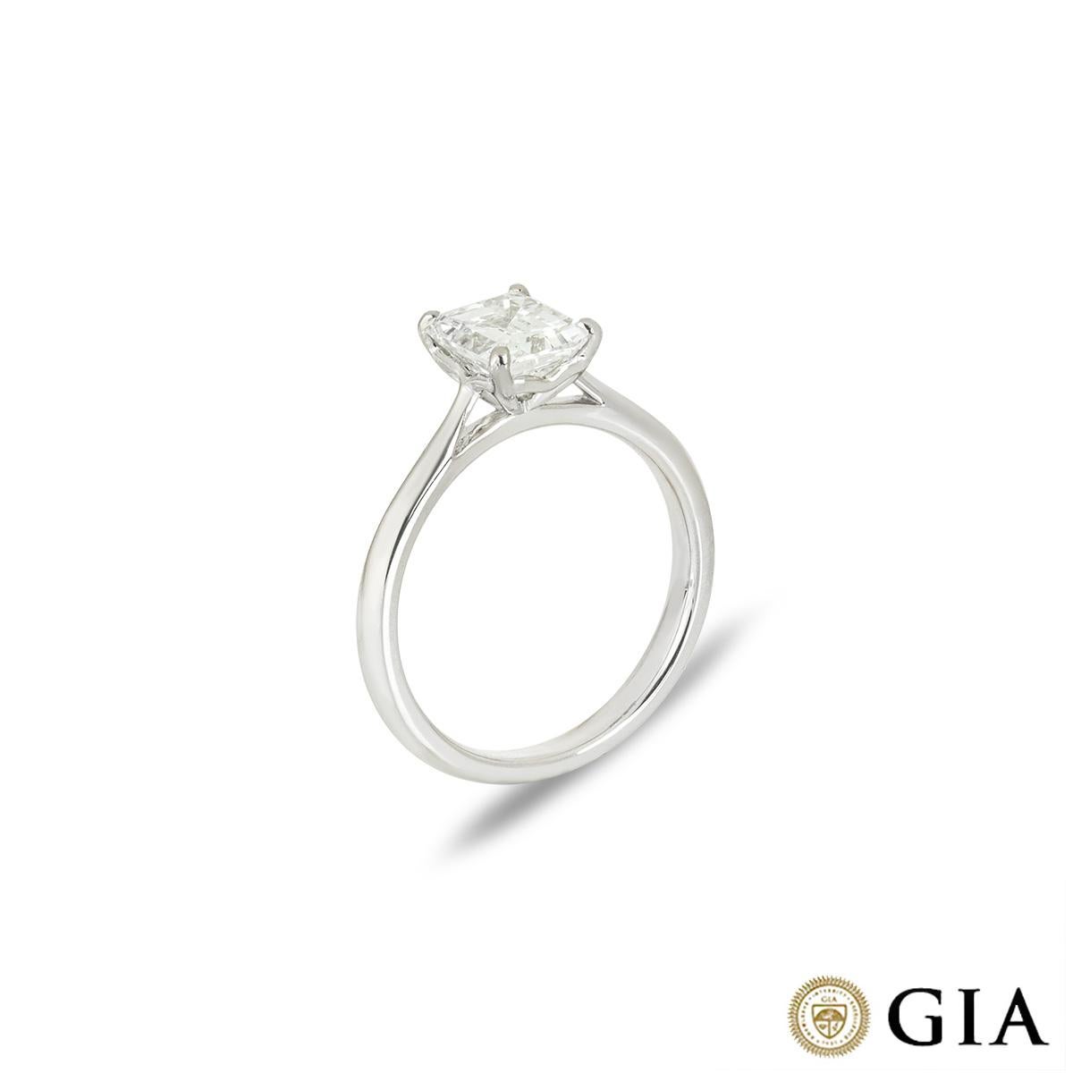 A stunning platinum diamond engagement ring. The solitaire features an emerald cut diamond set in a four prong mount weighing 1.51ct, E colour and VS2 clarity. The ring tapers from 1.5mm to 2.5mm, has a gross weight of 4.51 grams and is currently a