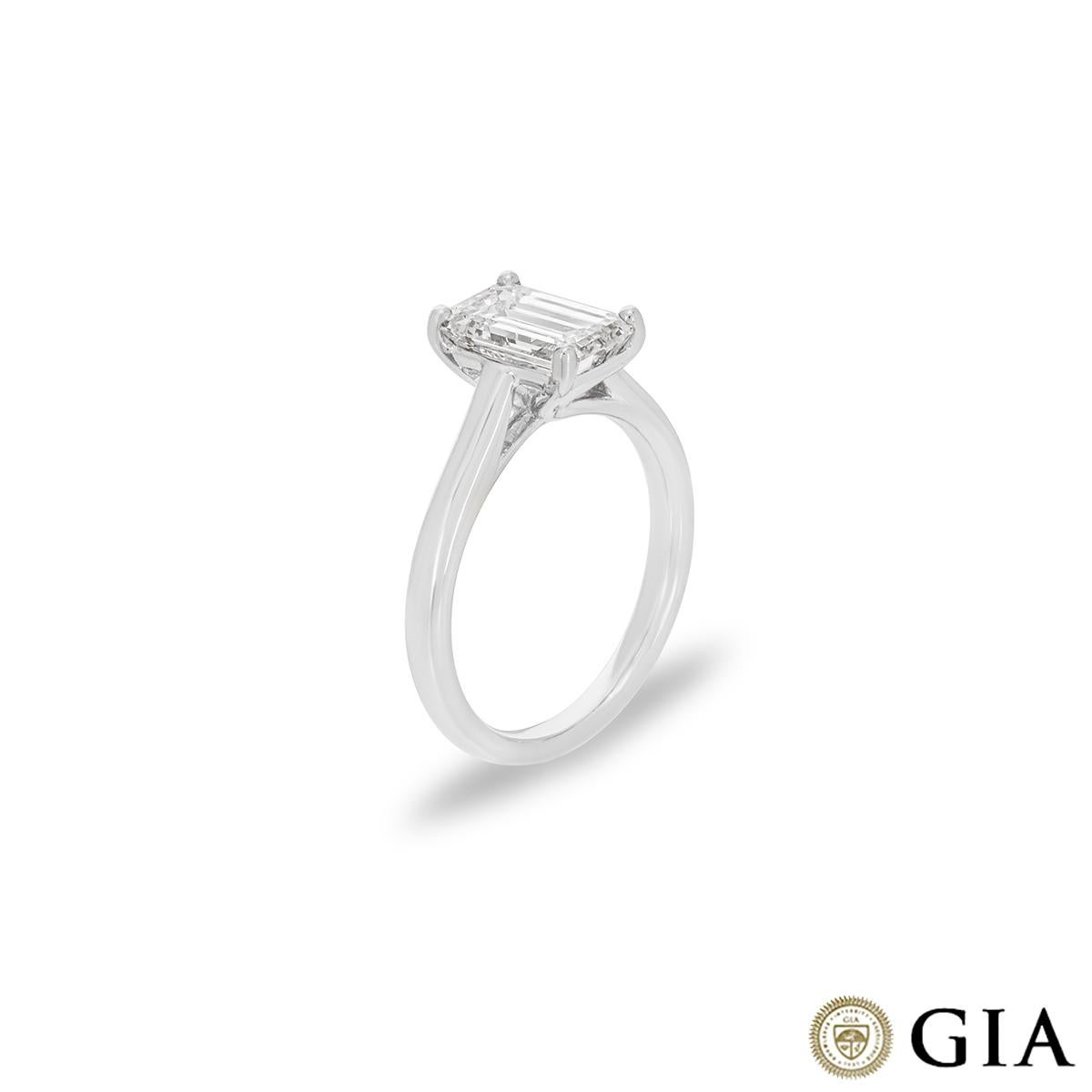 A gorgeous platinum diamond engagement ring. The solitaire is set to the centre with an emerald cut diamond weighing 2.01ct, F colour and VS1 clarity. The ring measures 2mm in width, has a gross weight of 5.75 grams and is currently a UK size M½/ US