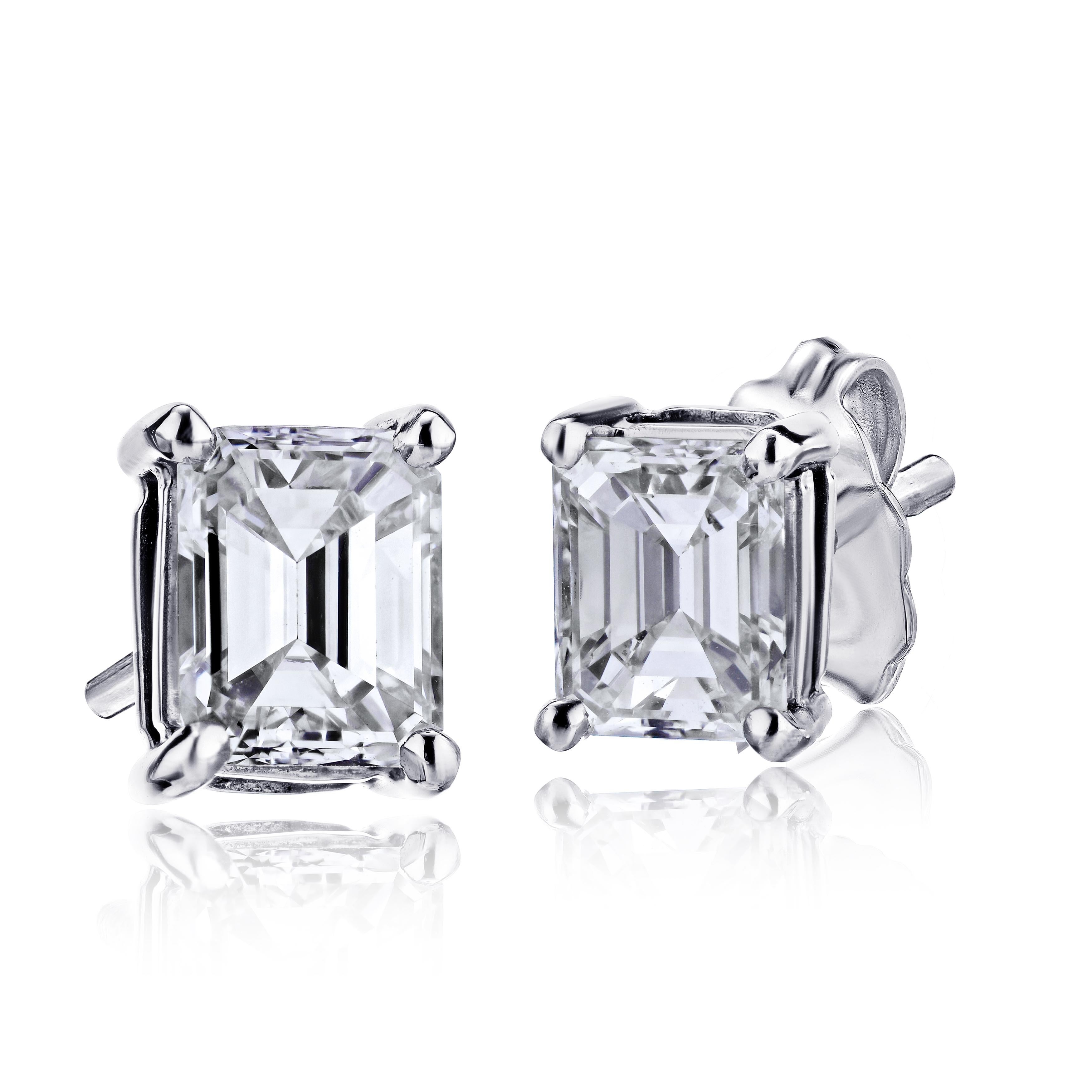 Contemporary GIA Certified Platinum Emerald Cut Diamond Studs 0.75 Carat Total For Sale