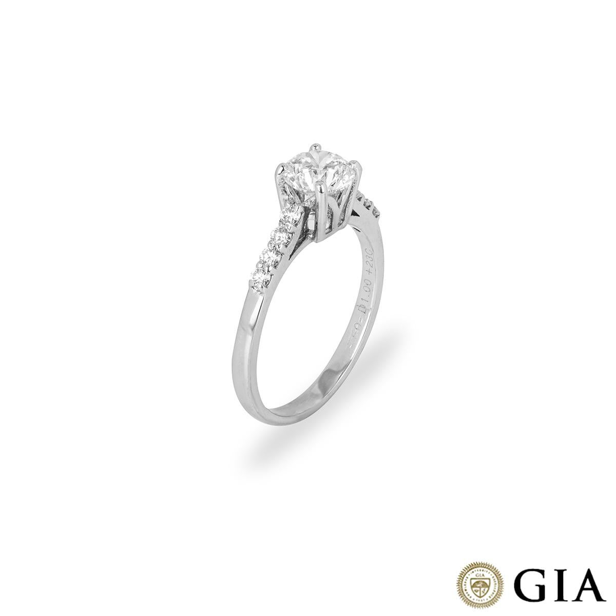 A beautiful platinum diamond engagement ring. The round brilliant cut diamond in a four claw setting weighs 1.51ct, is E colour and VVS2 in clarity. The ring is currently a size UK M½/US 6.5/EU 53 but can be adjusted for a perfect fit with a gross