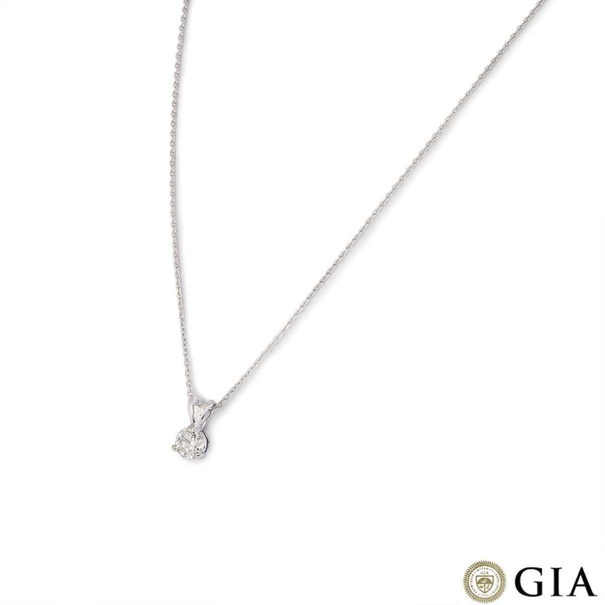 A diamond pendant in platinum. The pendant is set with a single round brilliant cut diamond weighing 0.70ct, G colour and VS1 clarity. The pendant comes on an 18 inch trace chain, complete with a boltring clasp. The necklace has a gross weight of