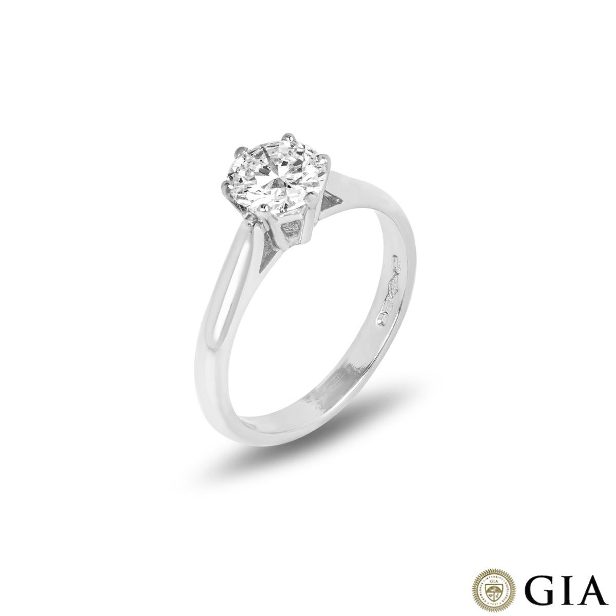 A gorgeous platinum diamond solitaire ring. The engagement ring features a round brilliant cut diamond set in a six prong mount weighing 1.00ct, D colour and IF clarity (internally flawless). The ring has a gross weight of 4.71 grams and is