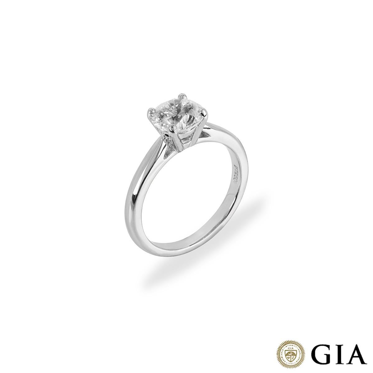 A stunning diamond solitaire ring set in platinum. The engagement ring is set to the centre with a round brilliant cut diamond weighing 1.77ct, E colour and VS1 clarity. The 2.5mm ring has a gross weight of 5.75 grams and is currently a UK size M /
