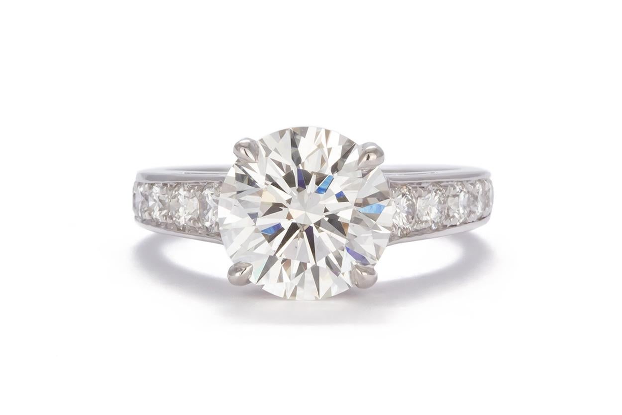 We are pleased to offer this GIA Certified Platinum & Round Diamond Solitaire Engagement Ring. This beautiful ring features a GIA certified & laser inscribed 3.26ct I/SI1 Round Brilliant cut diamond set in a platinum 4 prong setting with an