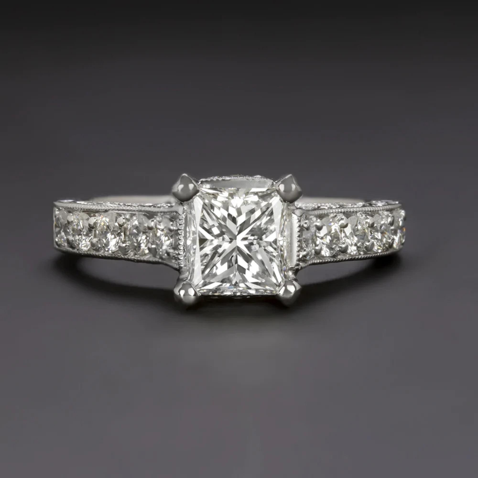 GIA certified G VS1 radiant cut diamond in a luxurious 18k white gold setting! The shank of the sleek and substantial setting glitter with excellent cut, bright white, and exceptionally clean accent diamonds and add a luxurious and refined touch.