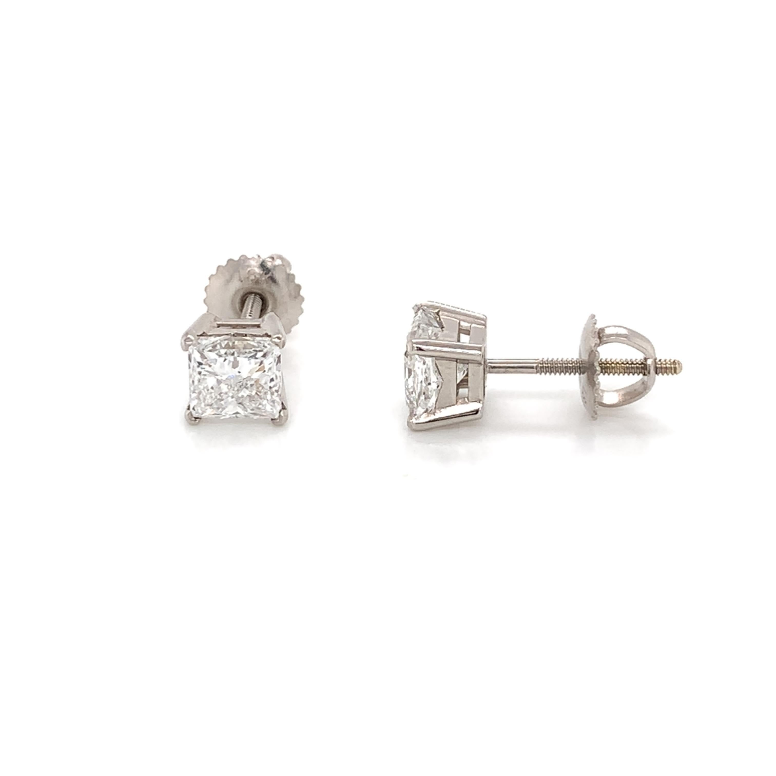 Princess Cut Diamond Studs made with real/natural GIA Certified Diamonds. Diamond Quantity: 2 (Princess Cut Diamonds). Total Weight: 1.90 carats. Diamond Color: E. Clarity: I1. Mounted on 18kt white gold screw-back setting.