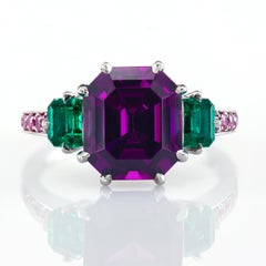 Leon Mege GIA Certified Purple Garnet with Emeralds Platinum Three-Stone Ring