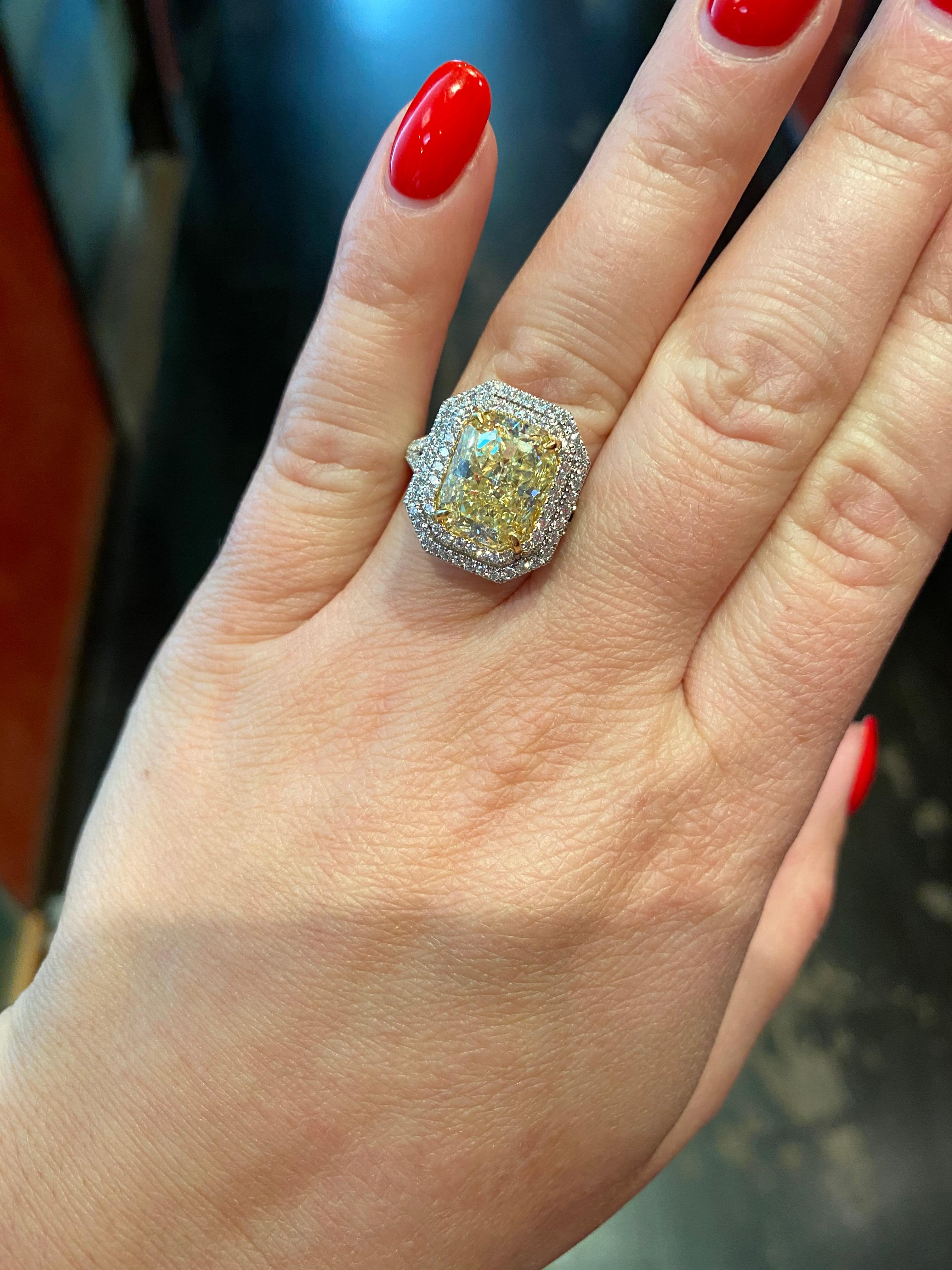 Platinum & 18K Yellow Gold Micro- Pave Ring with round brilliant cut diamonds weighing in total 1.20 carats. Center Diamond is GIA certified Radiant cut weighting 5.17 carats Fancy Yellow VS2.

Viewings available in our NYC wholesale office by