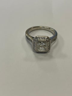 GIA Certified Radiant Cut Diamond Set in 18 Karat White Gold Halo Mounting