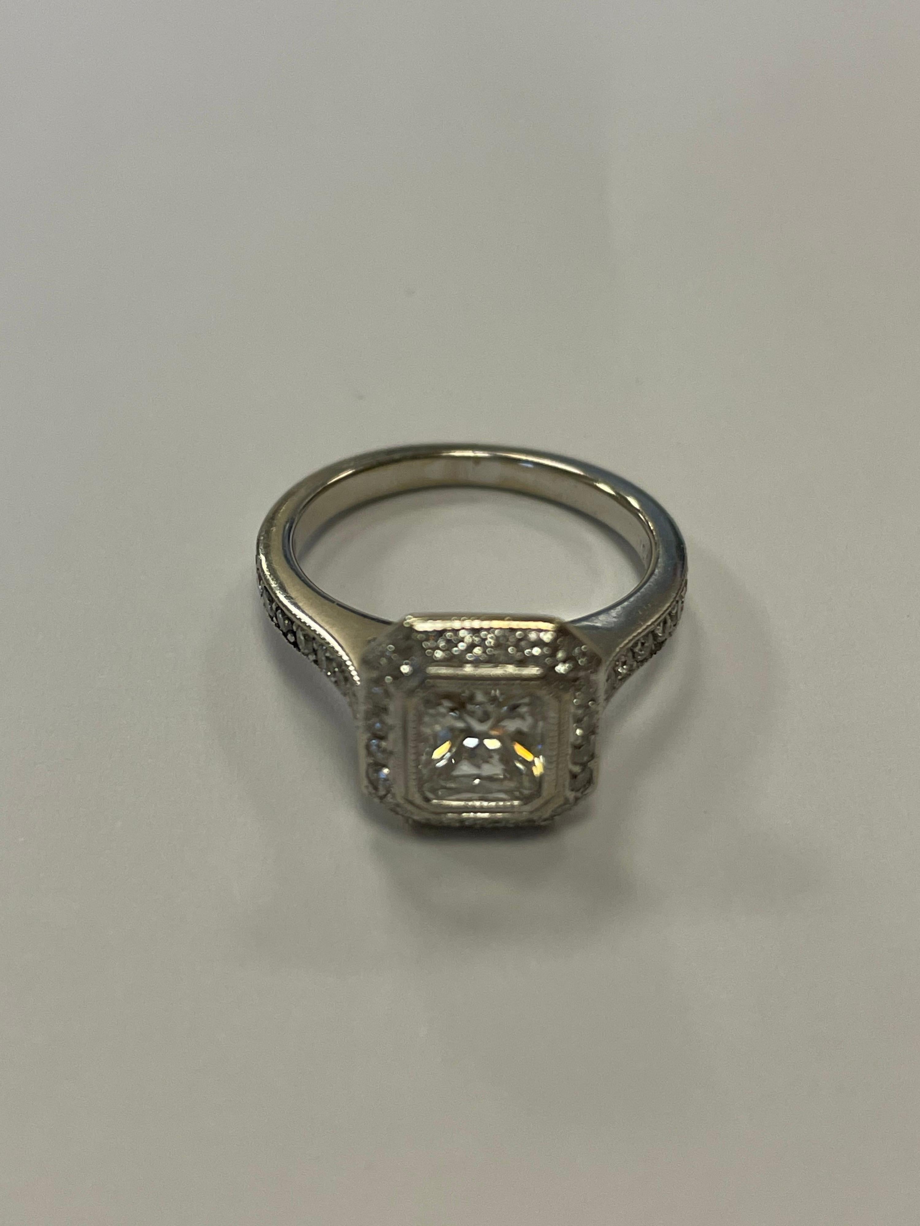 Contemporary GIA Certified Radiant Cut Diamond Set in 18 Karat White Gold Halo Mounting For Sale