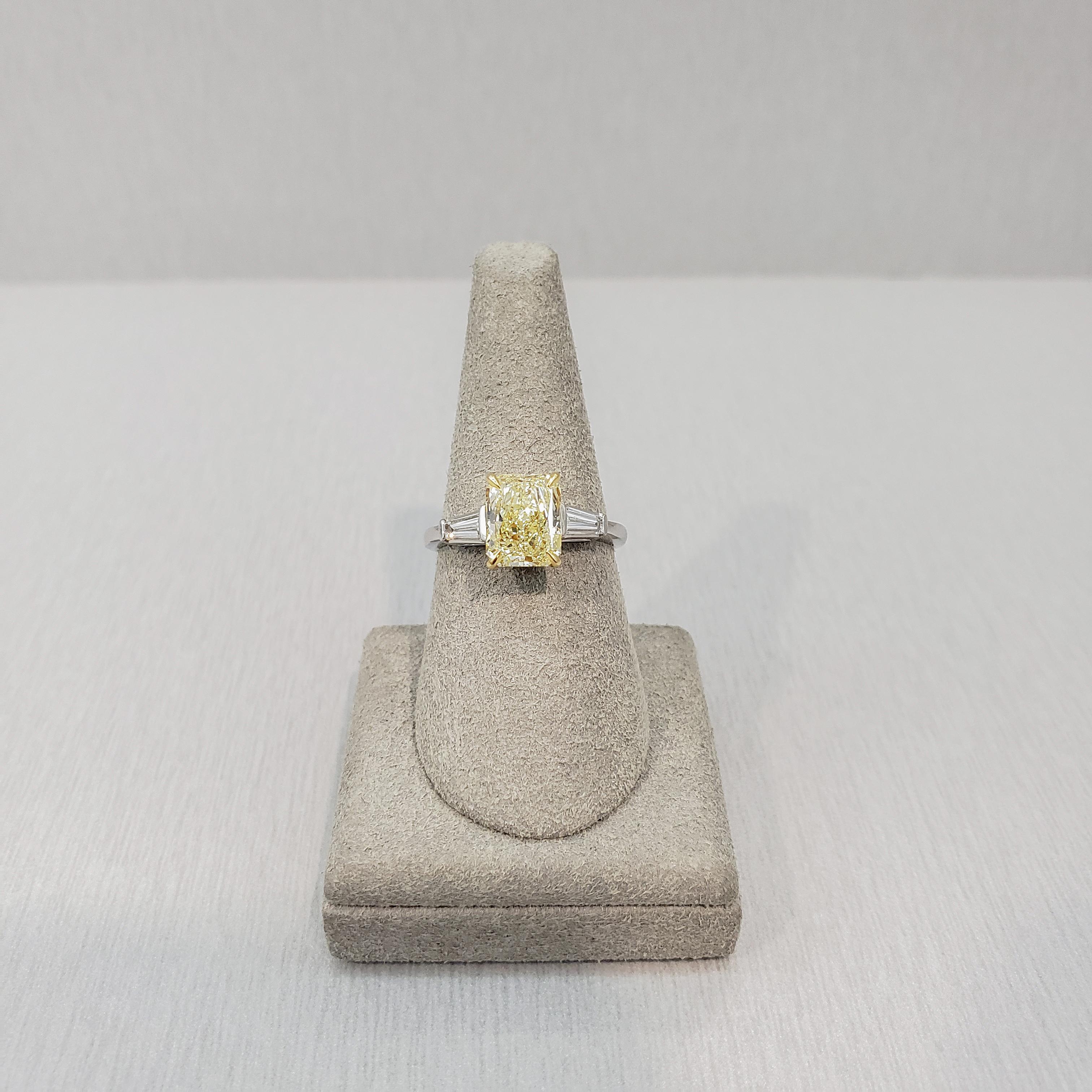 Contemporary GIA Certified 2.05 Carats Radiant Cut Yellow Diamond Three-Stone Engagement Ring For Sale