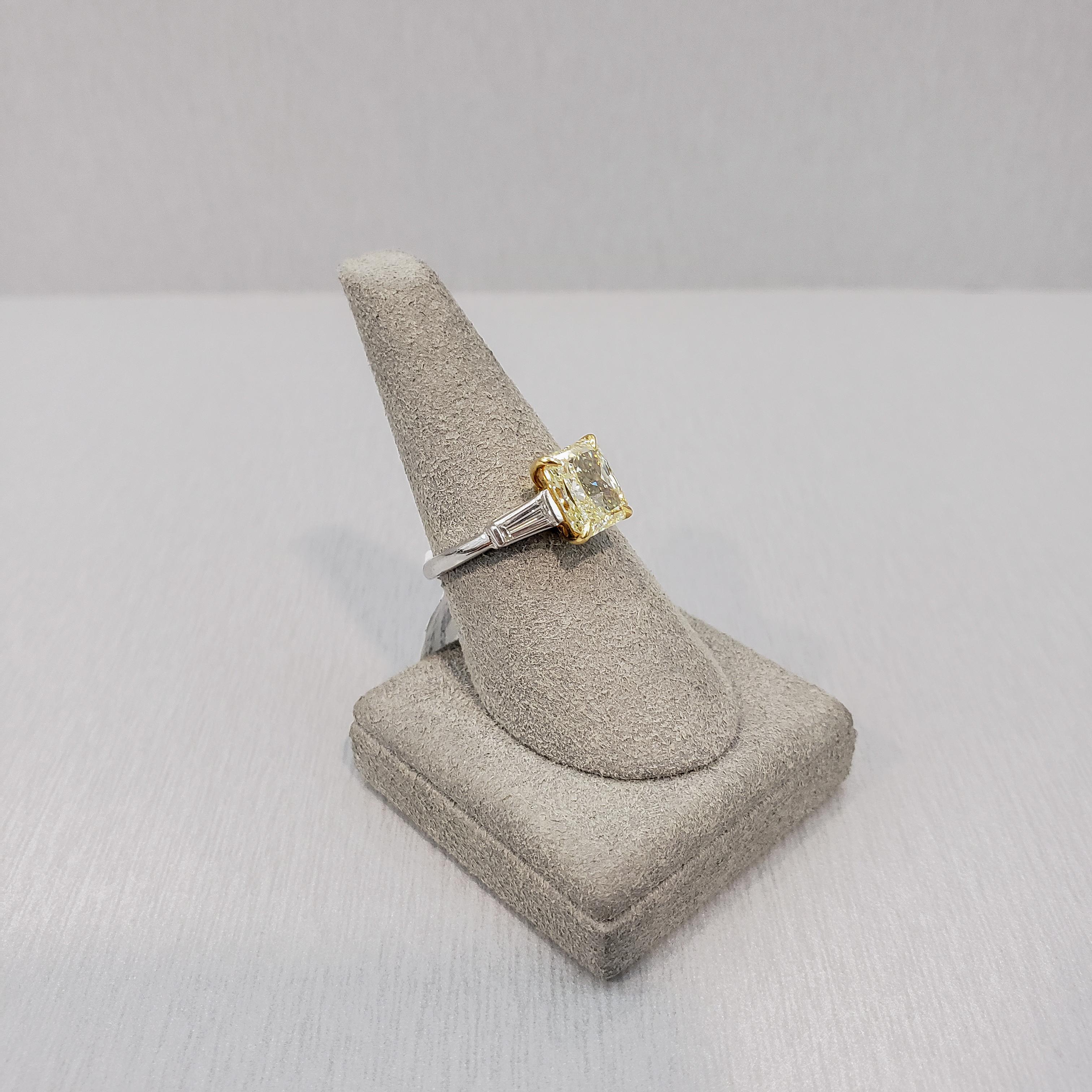 GIA Certified 2.05 Carats Radiant Cut Yellow Diamond Three-Stone Engagement Ring In New Condition For Sale In New York, NY