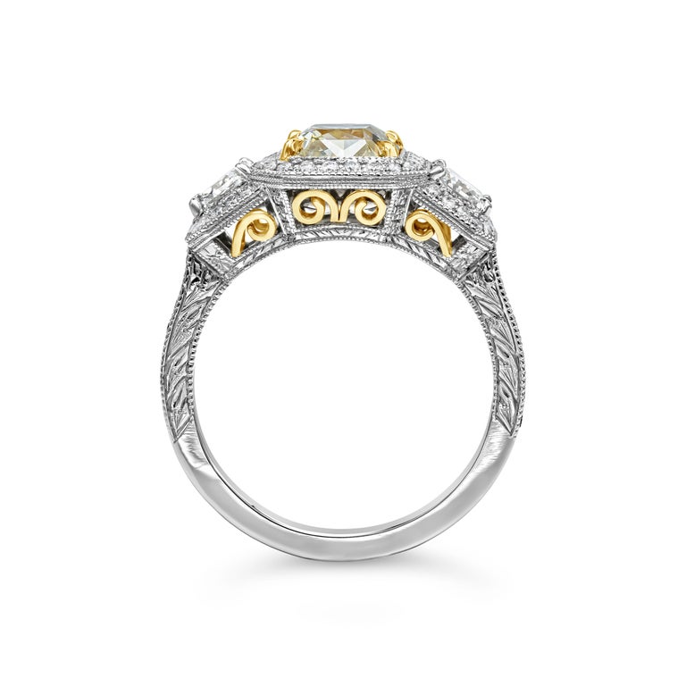 GIA Certified Radiant Cut Yellow Diamond Three-Stone Halo Engagement Ring In New Condition For Sale In New York, NY