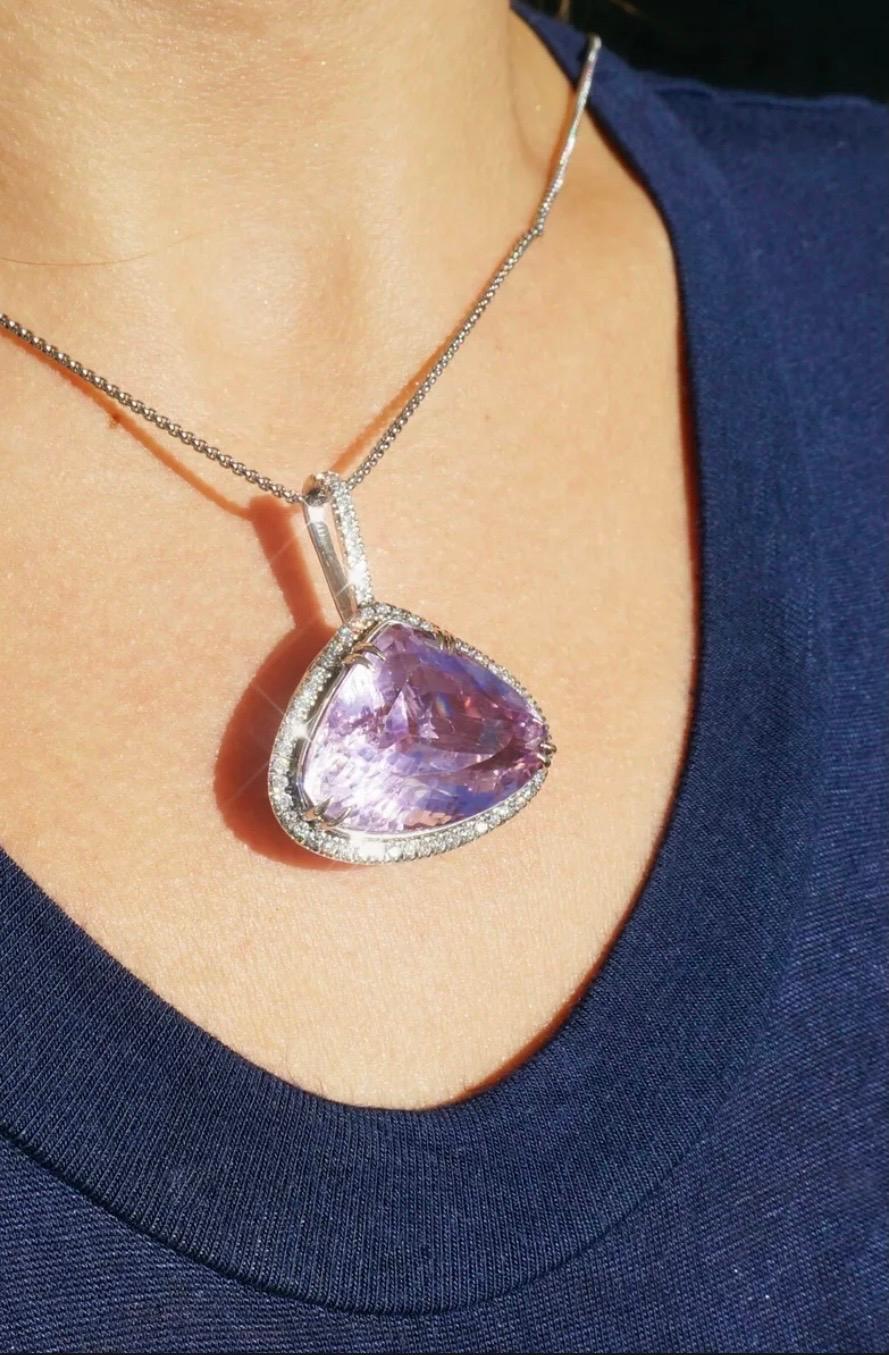 A Breathtakingly Striking HANDMADE 14k White Gold Pendant with Beautiful Heart Cut Kunzite in Purple-Pink color! The GEM is 60.58CT and  measures 23.96x29.47x15.26mm! This Stone will take your breath away, especially on the sunlight! You will want
