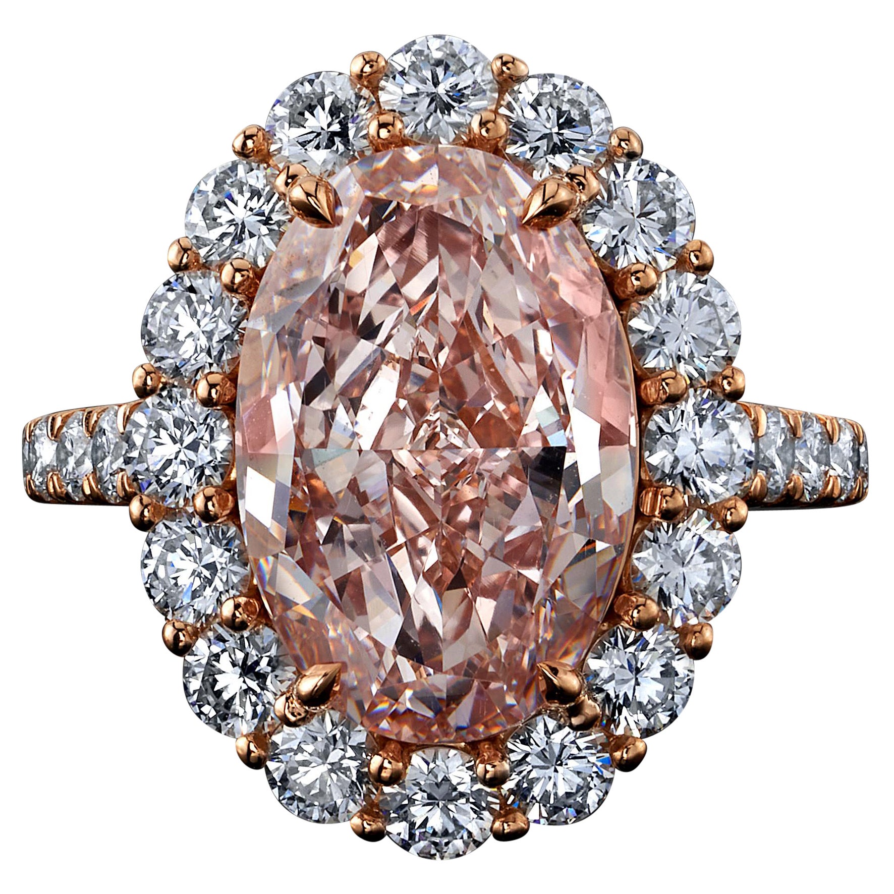 6,11ct Fancy Pink Oval Diamant, VVS1,  Ring aus Platin und Roségold mit 2,155cttw = 64 farblosen Diamanten und 28 psc = 0,31cttw Pink melee

GIA#5141867331

Dies ist einer dieser seltenen Diamanten, die einfach atemberaubend sind. Da rosafarbene