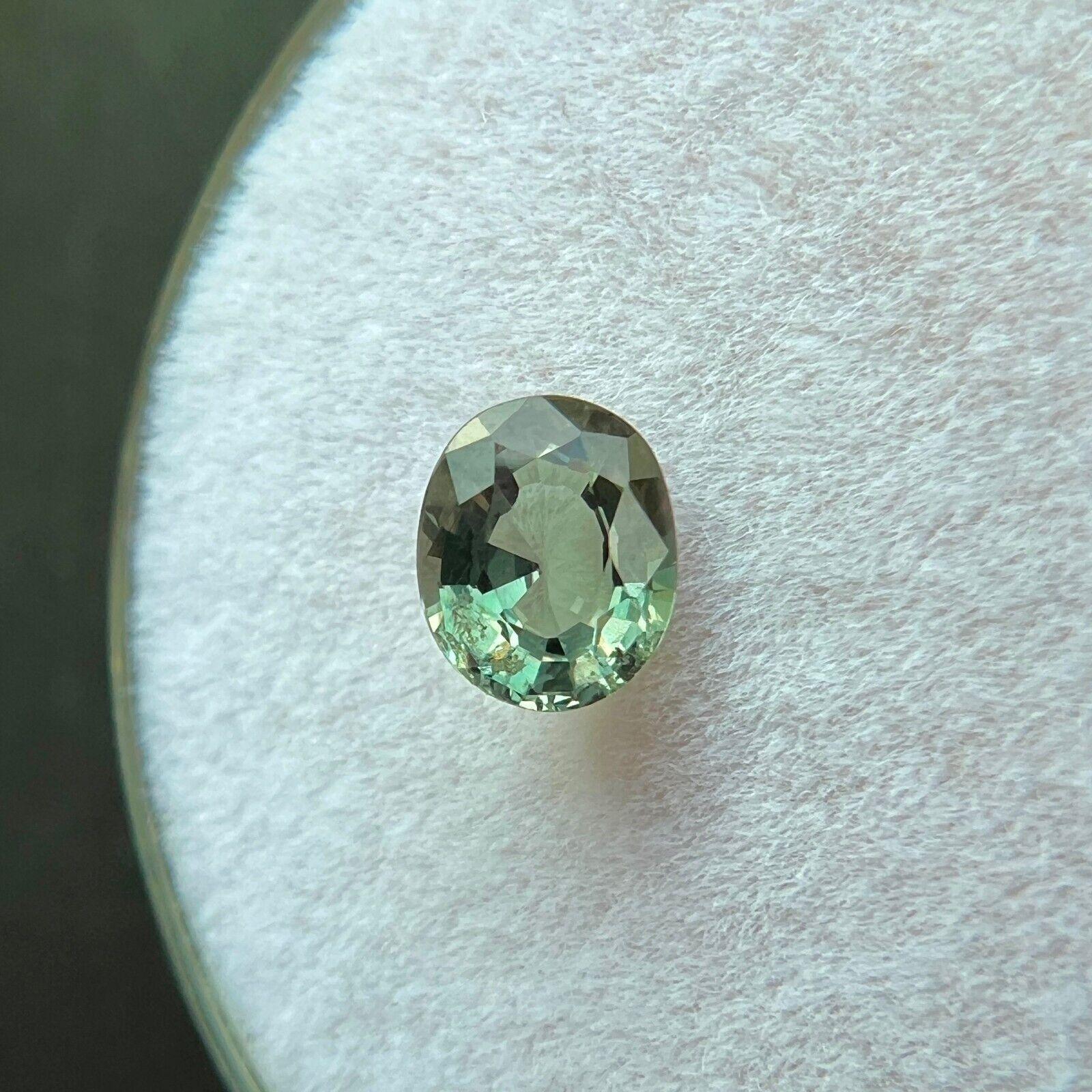 GIA Certificado Raro Natural Cambio de Color Granate 0,57ct Verde Púrpura Gema Talla Ovalada en venta 1